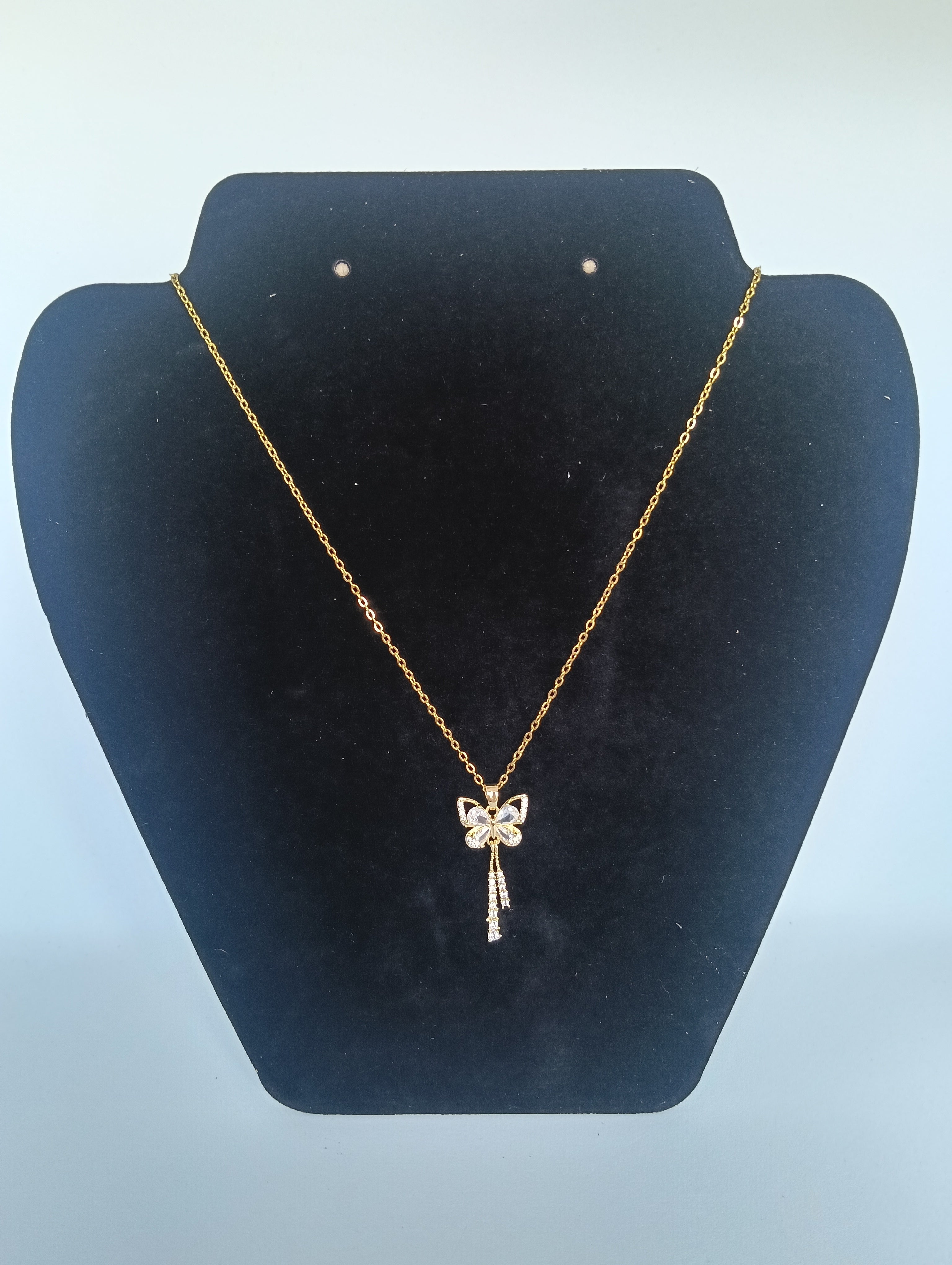 collier papillon et zircone